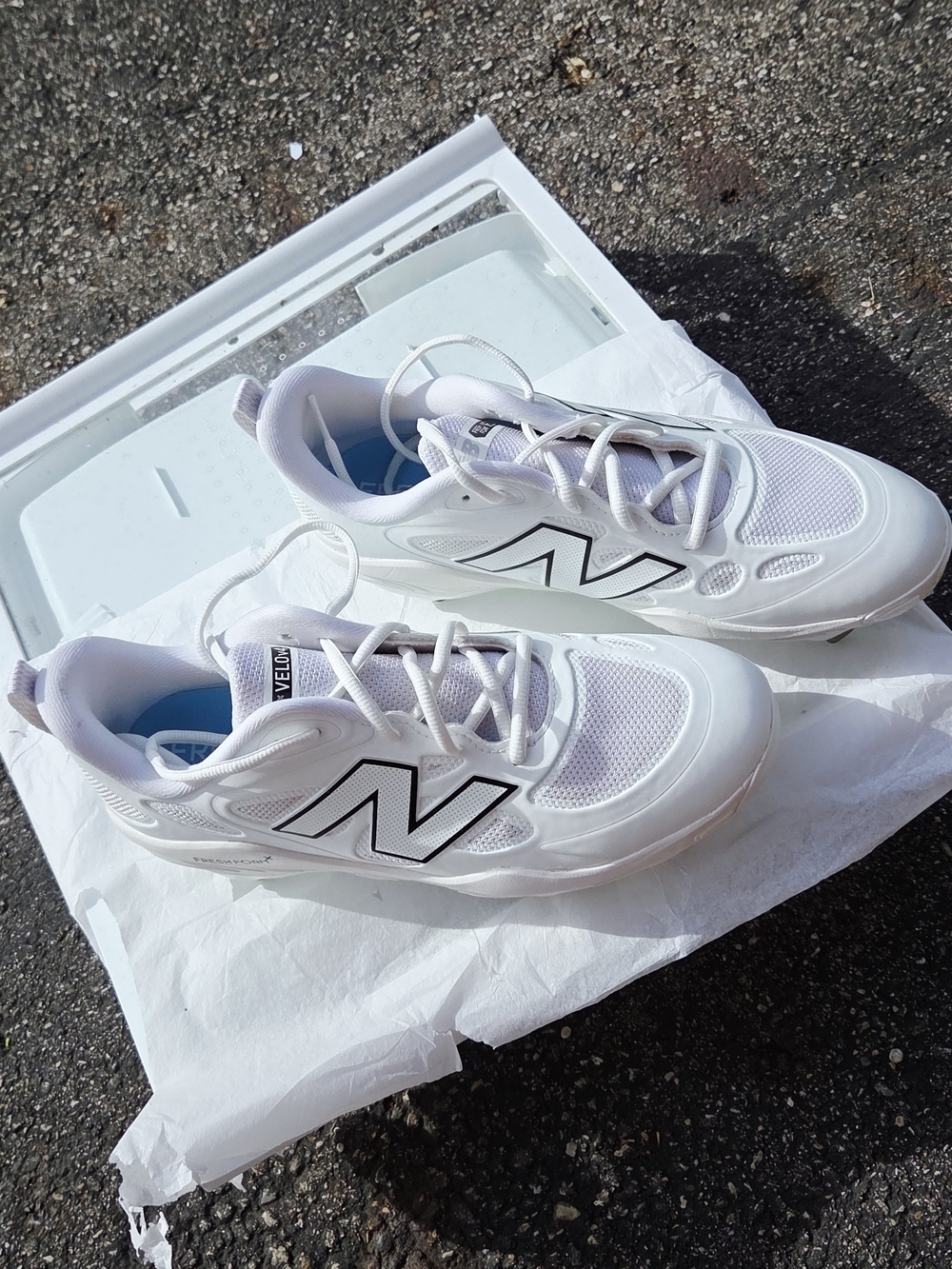 New Balance White Sneakers with Black 'N' Accent
